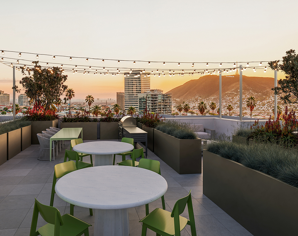 Rooftop outdoor amenity space with views of Los Angeles